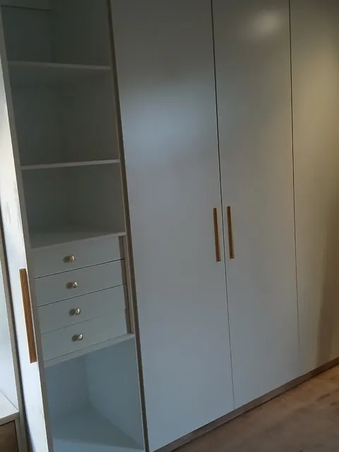 Wardrobe with open shelving and drawers